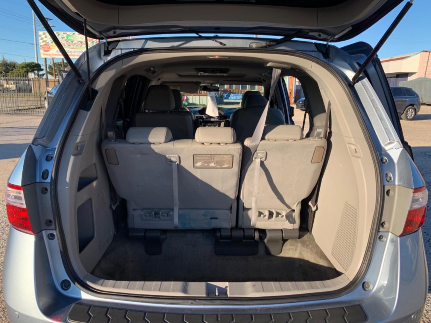 2012 Blue /gray Honda Odyssey Touring (5FNRL5H94CB) with an 3.7L L5 DOHC 20V engine, AUTOMATIC transmission, located at 1830 North Belt Line Road, Irving, TX, 75061, (469) 524-0199, 32.834373, -96.993584 - Photo#10